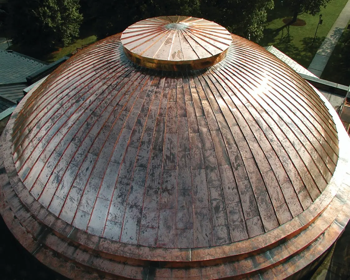 Craftsman Roofing crew installing a new roof in Kingdom Hall